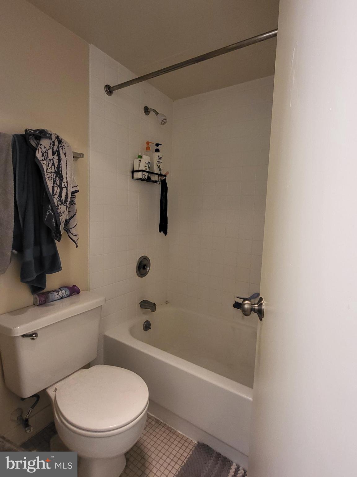 2020 Walnut Street, Unit 22A Philadelphia, PA 19103 - Photo 7 of 22 a bathroom with a toilet and a shower