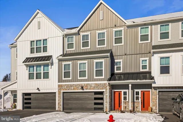 a front view of a large white building