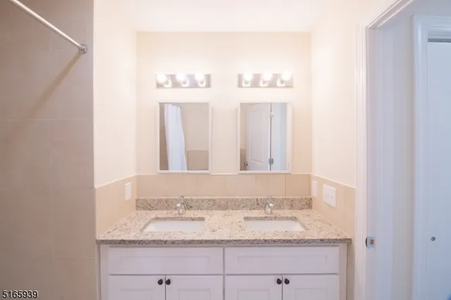 a bathroom with a toilet a sink and a bathtub