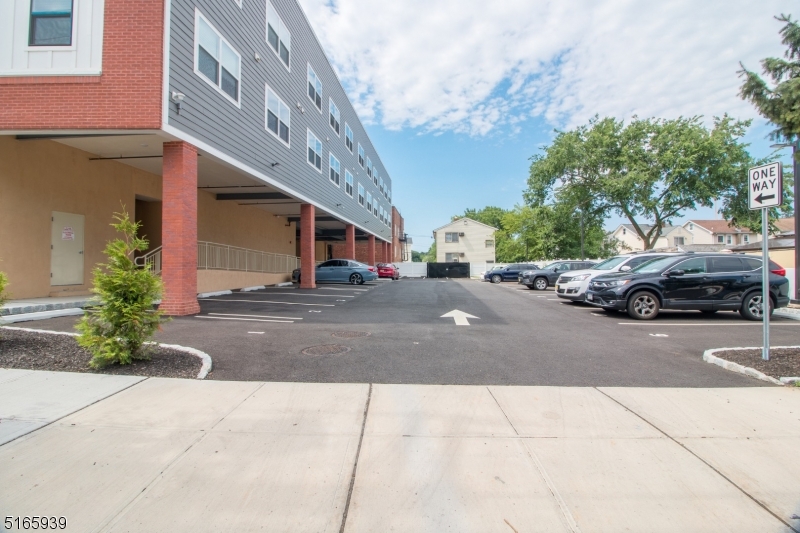1664 Stuyvesant Avenue, Unit 306 Union, NJ 07083 - Photo 21 of 22 a cars parked on the side of a street