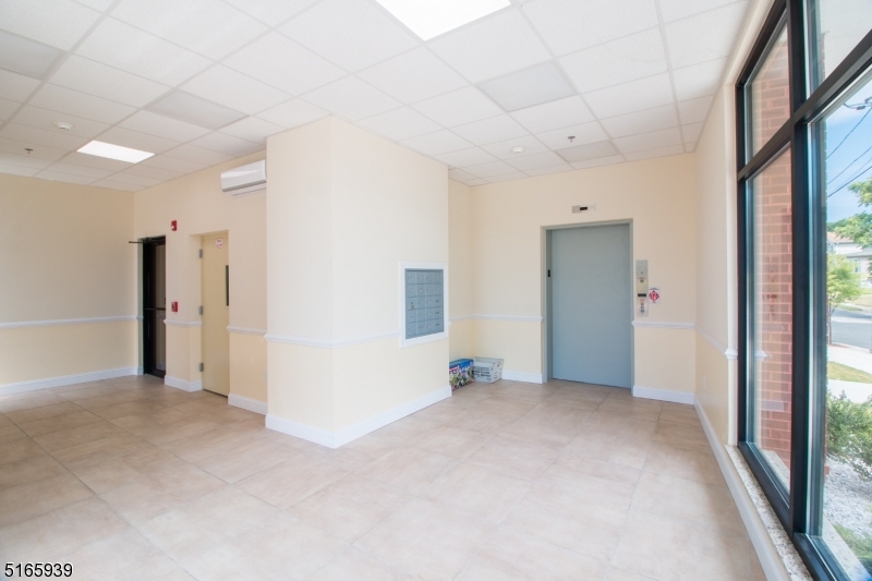 1664 Stuyvesant Avenue, Unit 306 Union, NJ 07083 - Photo 3 of 22 a view of empty room with a fireplace