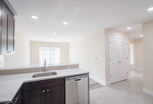 a kitchen with a sink and a stove