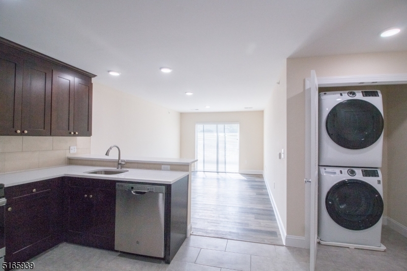 1664 Stuyvesant Avenue, Unit 306 Union, NJ 07083 - Photo 8 of 22 a kitchen with a sink and a stove