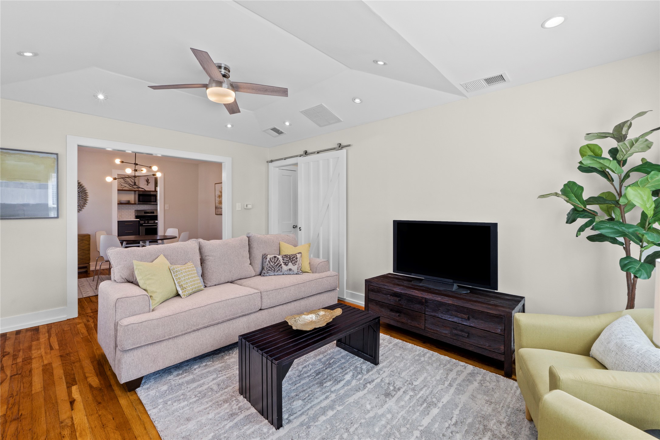 7803 Watson Street Austin, TX 78757 - Photo 5 of 30 Raised ceilings and original hardwood floors throughout.