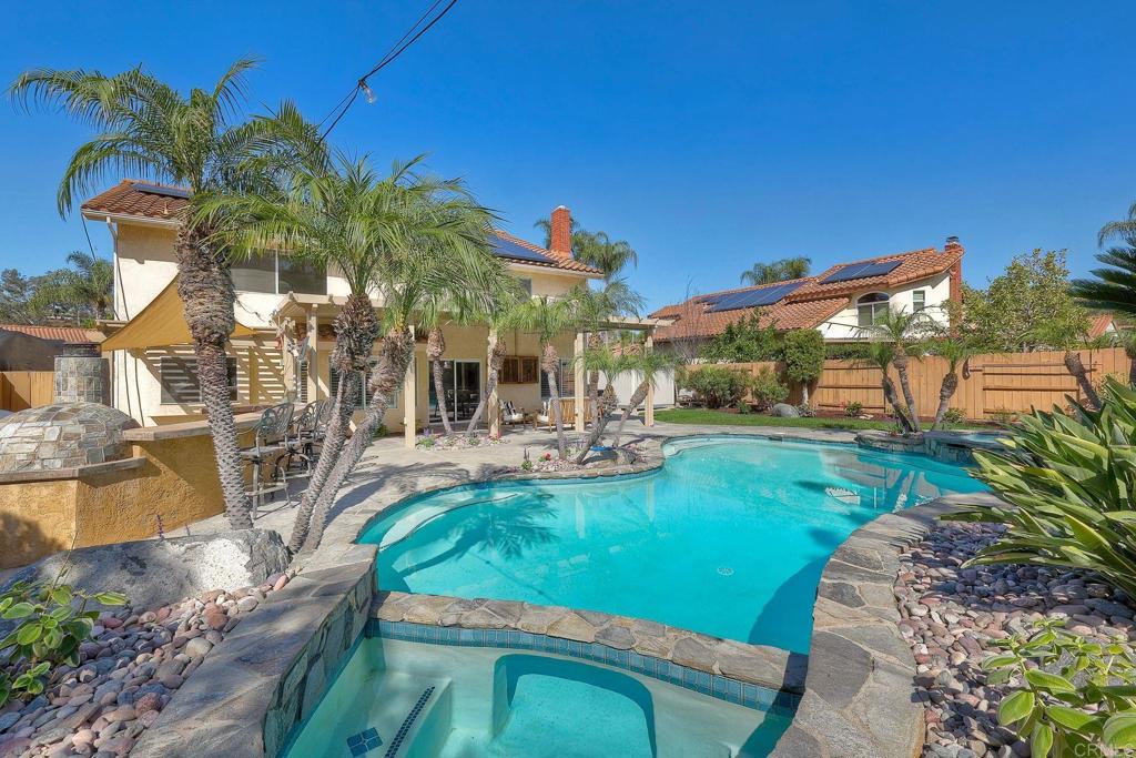 13979 Hickory Street Poway, CA 92064 - Photo 18 of 37 a view of yard with swimming pool and sitting area
