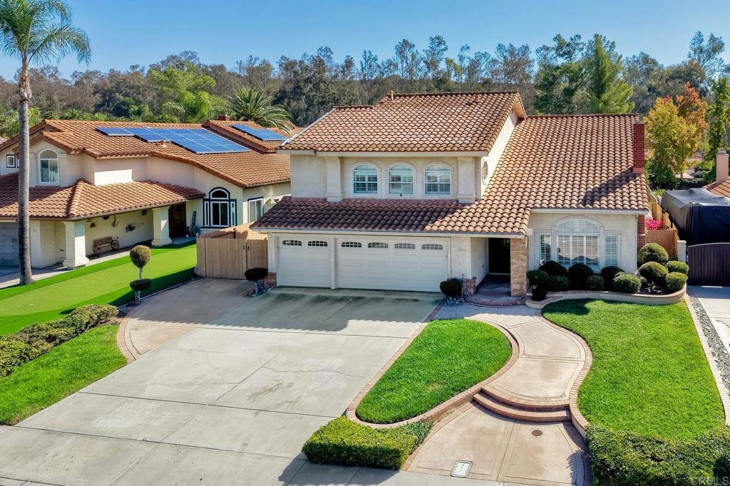 13979 Hickory Street Poway, CA 92064 - Photo 32 of 37 a front view of a house with garden