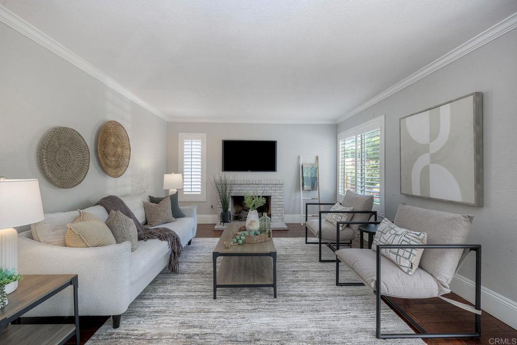 13979 Hickory Street Poway, CA 92064 - Photo 8 of 37 a living room with furniture and a flat screen tv