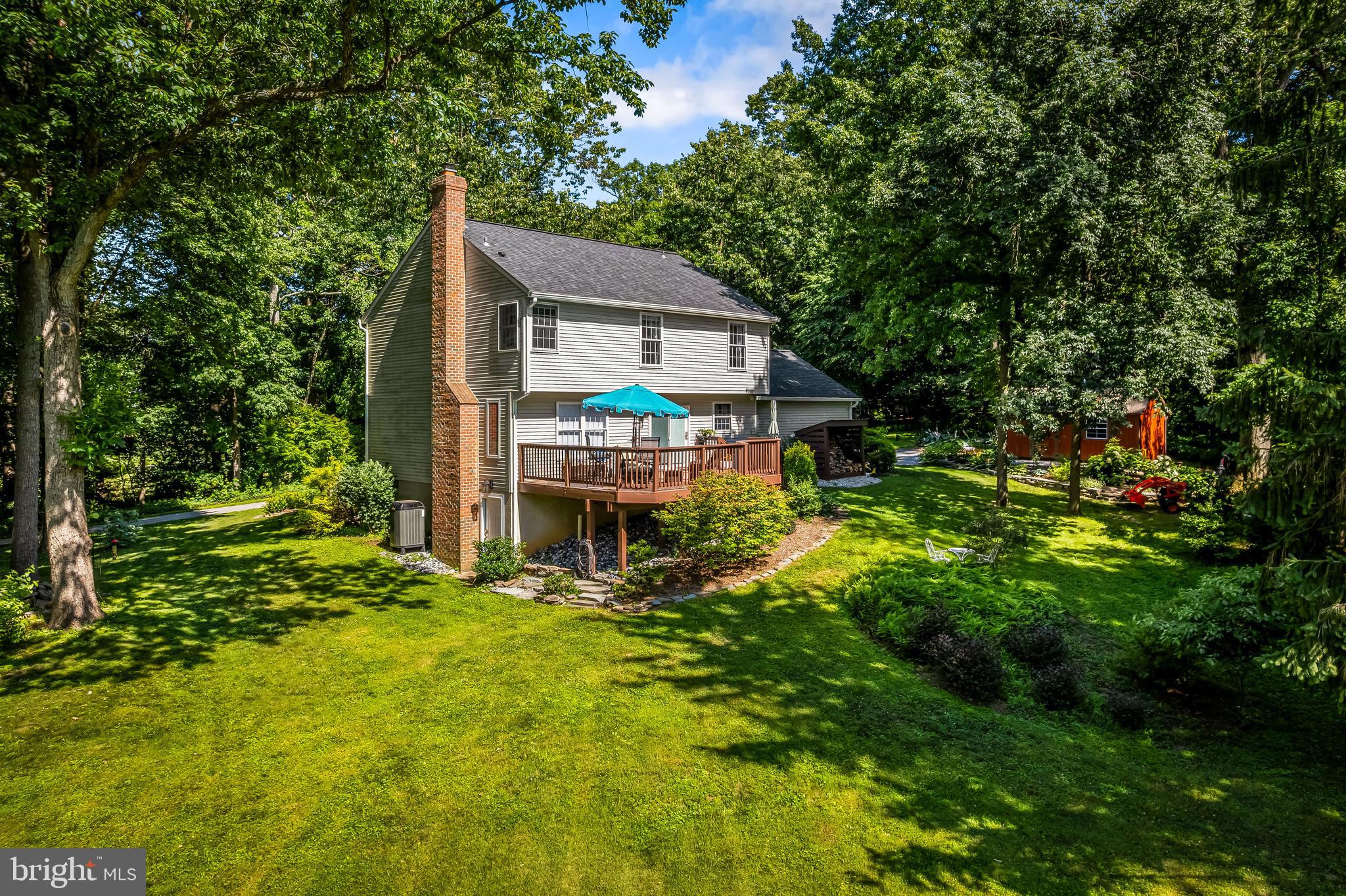 5026 Mt Carmel Road Hampstead, MD 21074 - Photo 52 of 57 a house view with a garden space