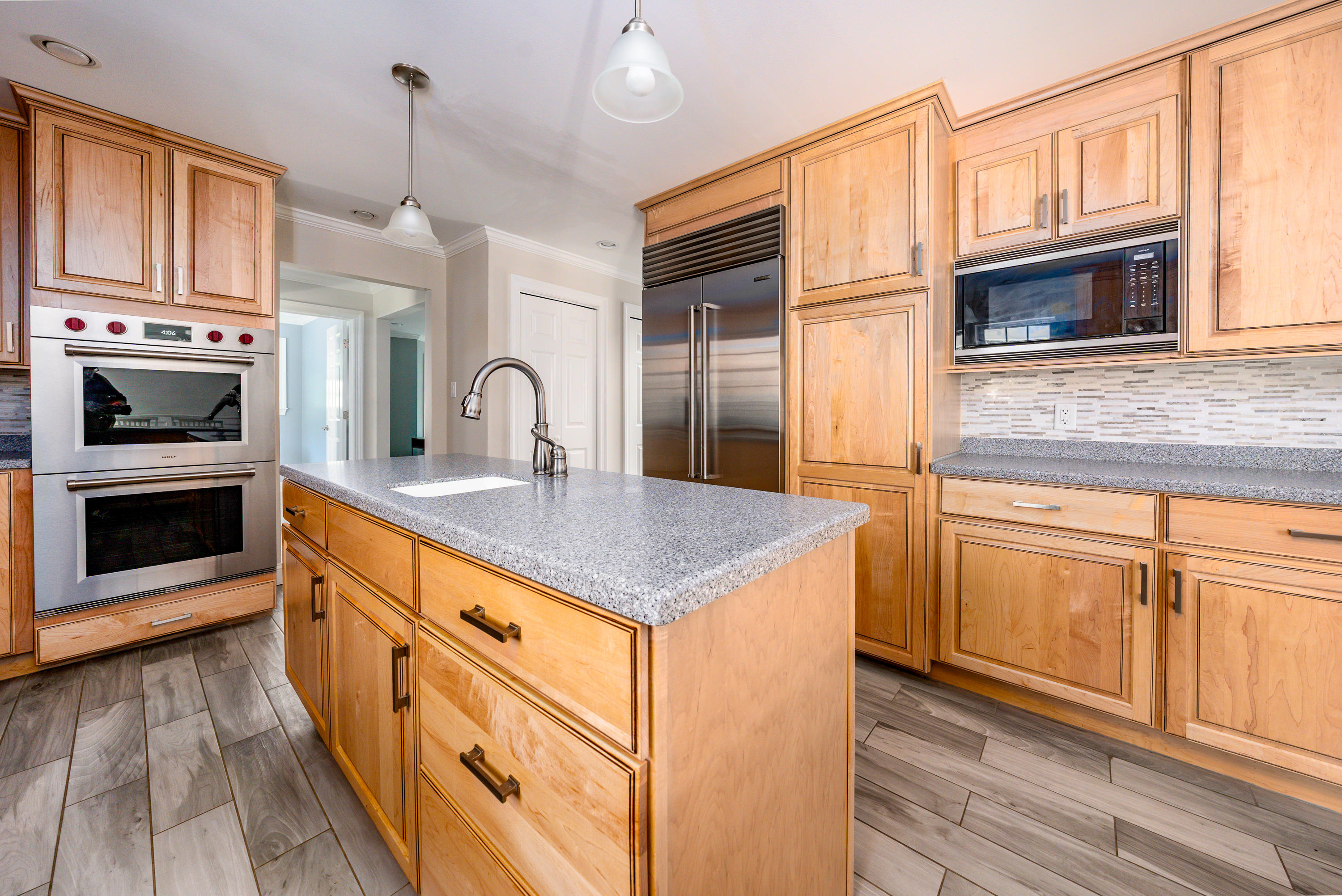 52 Pleasant Bay Road Harwich, MA 02645 - Photo 15 of 43 a kitchen with stainless steel appliances granite countertop a stove a sink and a microwave