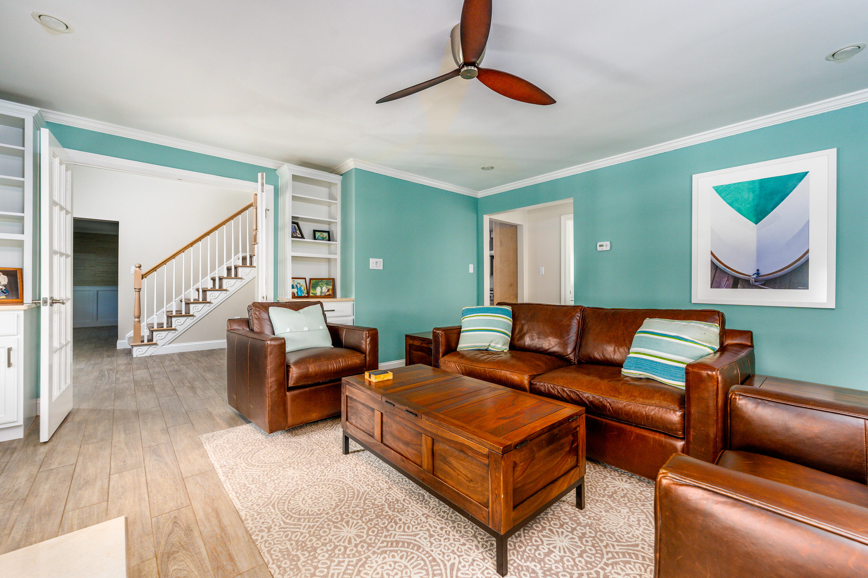 52 Pleasant Bay Road Harwich, MA 02645 - Photo 20 of 43 a living room with furniture and a wooden floor