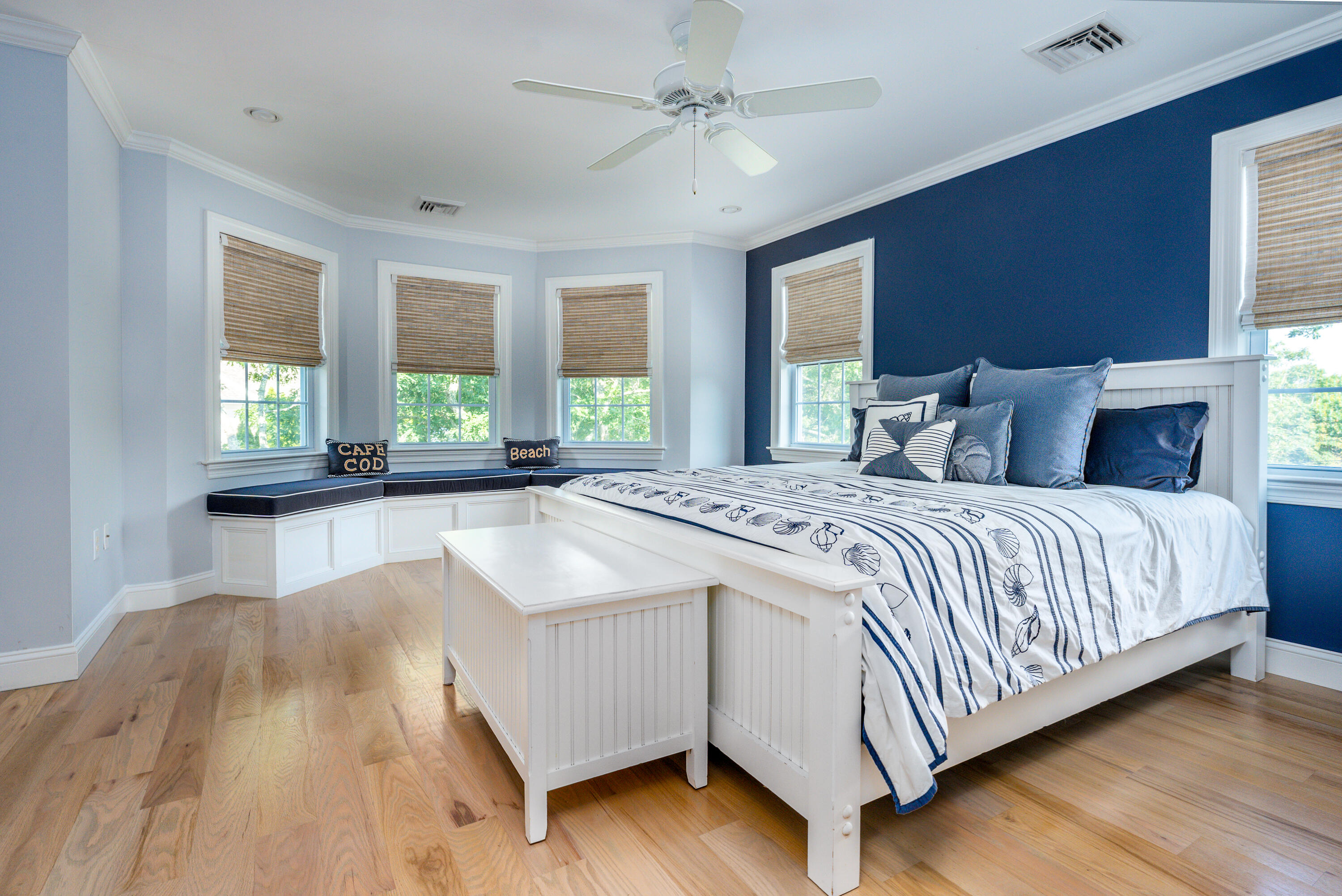 52 Pleasant Bay Road Harwich, MA 02645 - Photo 24 of 43 a bedroom with a large bed and a large window