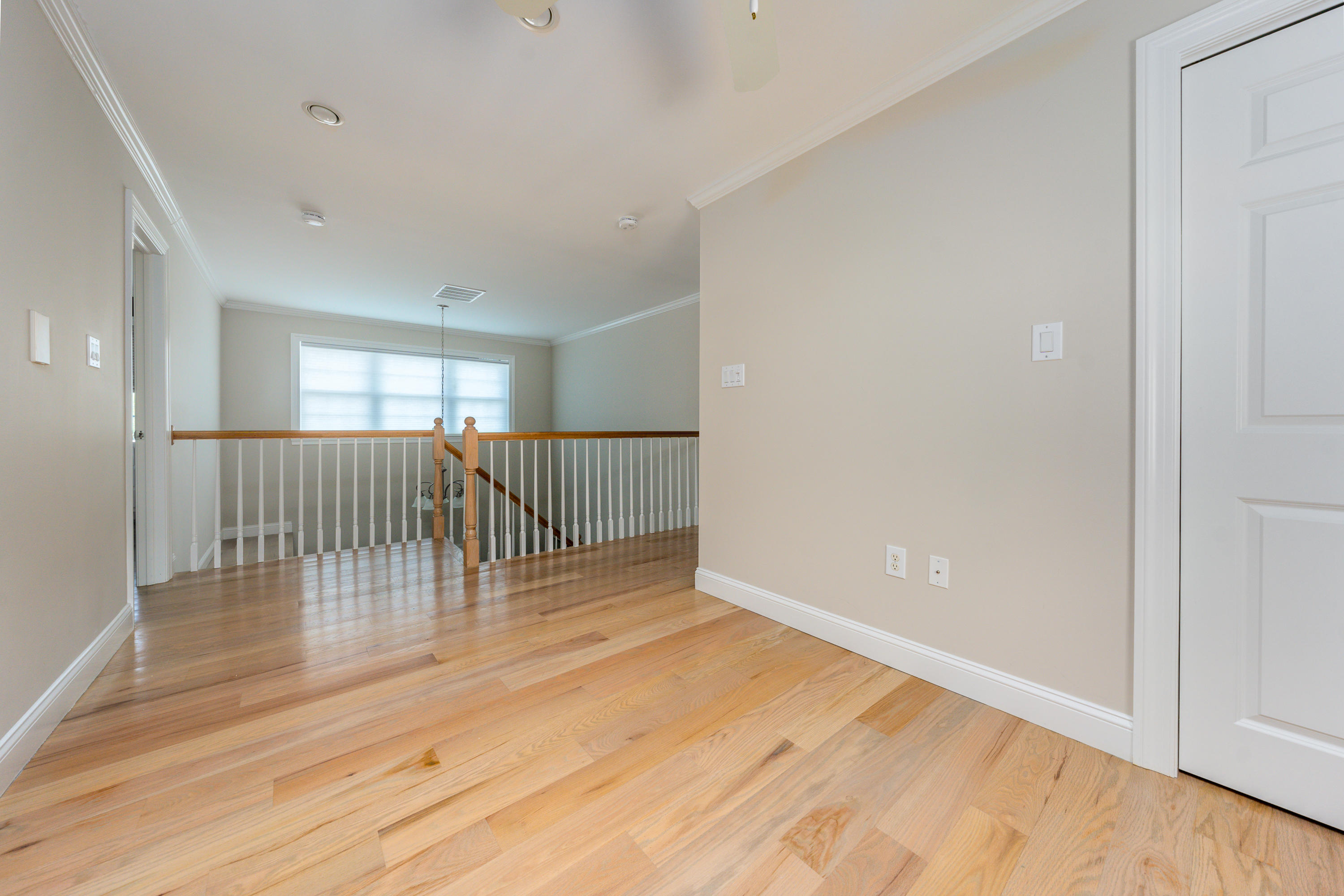 52 Pleasant Bay Road Harwich, MA 02645 - Photo 31 of 43 a view of a hallway with wooden floor