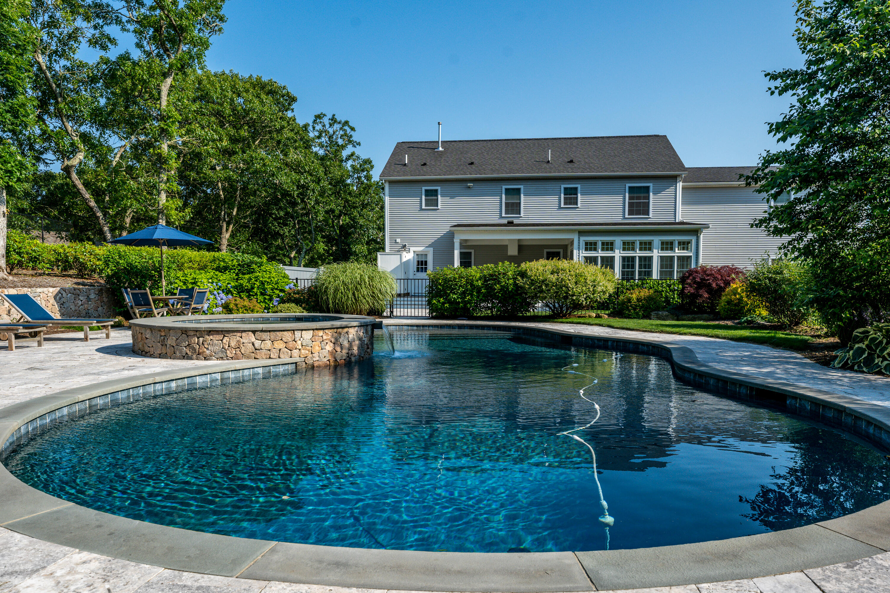 52 Pleasant Bay Road Harwich, MA 02645 - Photo 4 of 43 a view of house with swimming pool and outdoor space