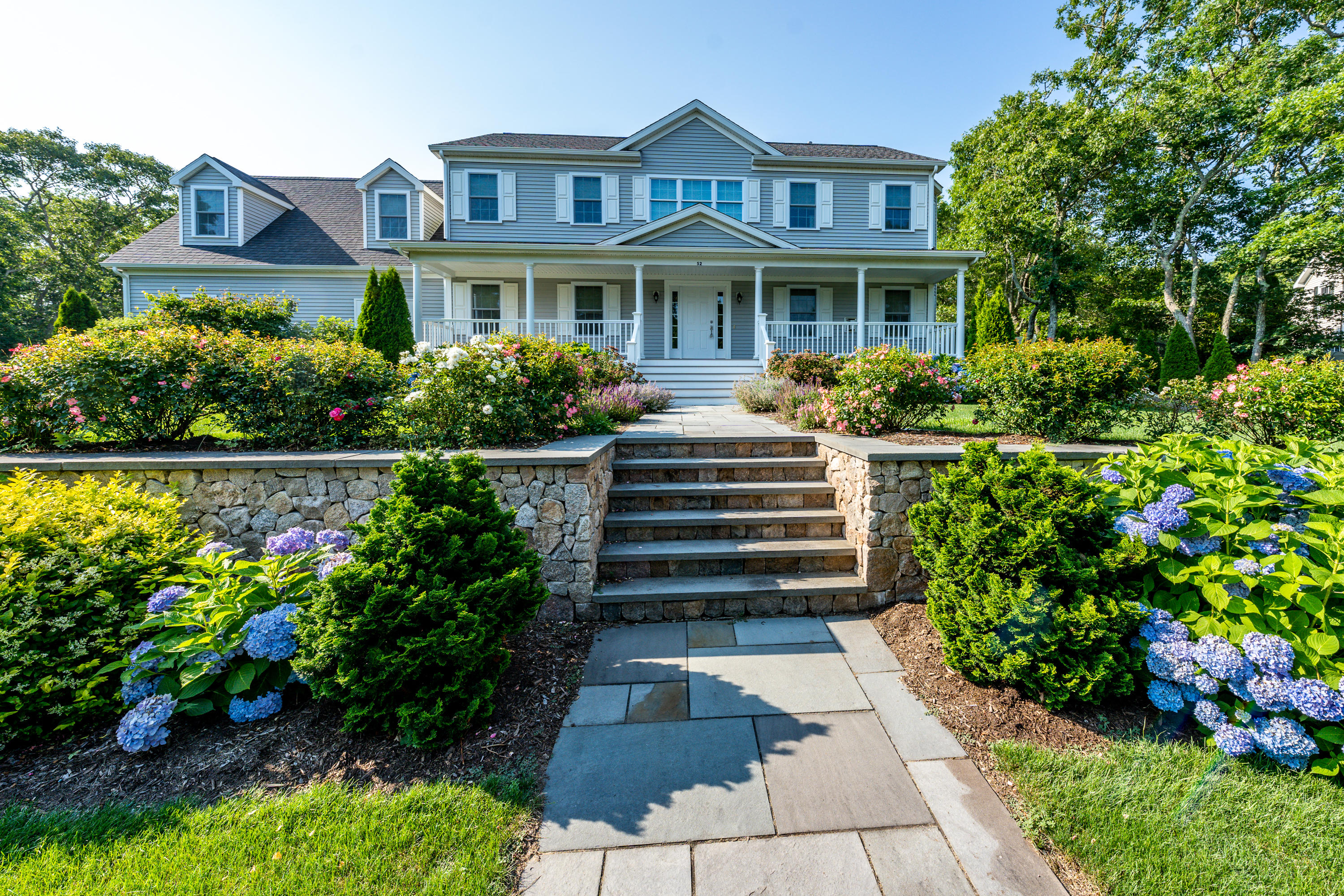 52 Pleasant Bay Road Harwich, MA 02645 - Photo 43 of 43 a house view with a garden space