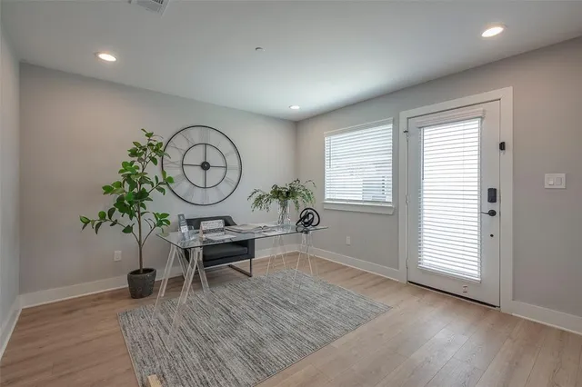 a view of a room with furniture window and wooden floor