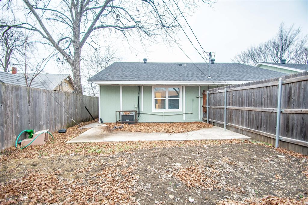 1817 Lipscomb Street Fort Worth, TX 76110 - Photo 10 of 10 Back of house with a patio area and central air condition unit