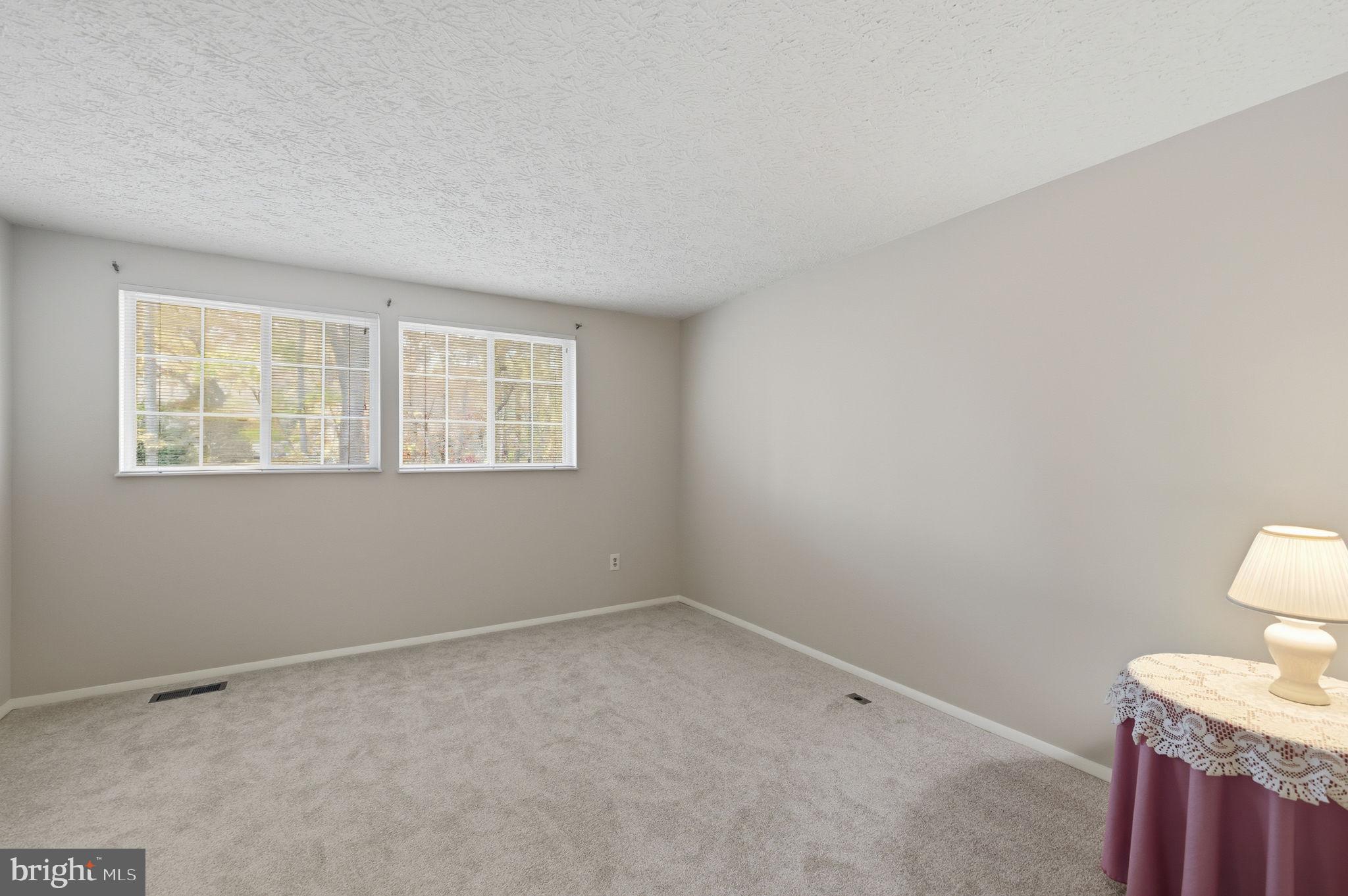 11563 Ivy Bush Court Reston, VA 20191 - Photo 12 of 48 a view of an empty room with a window