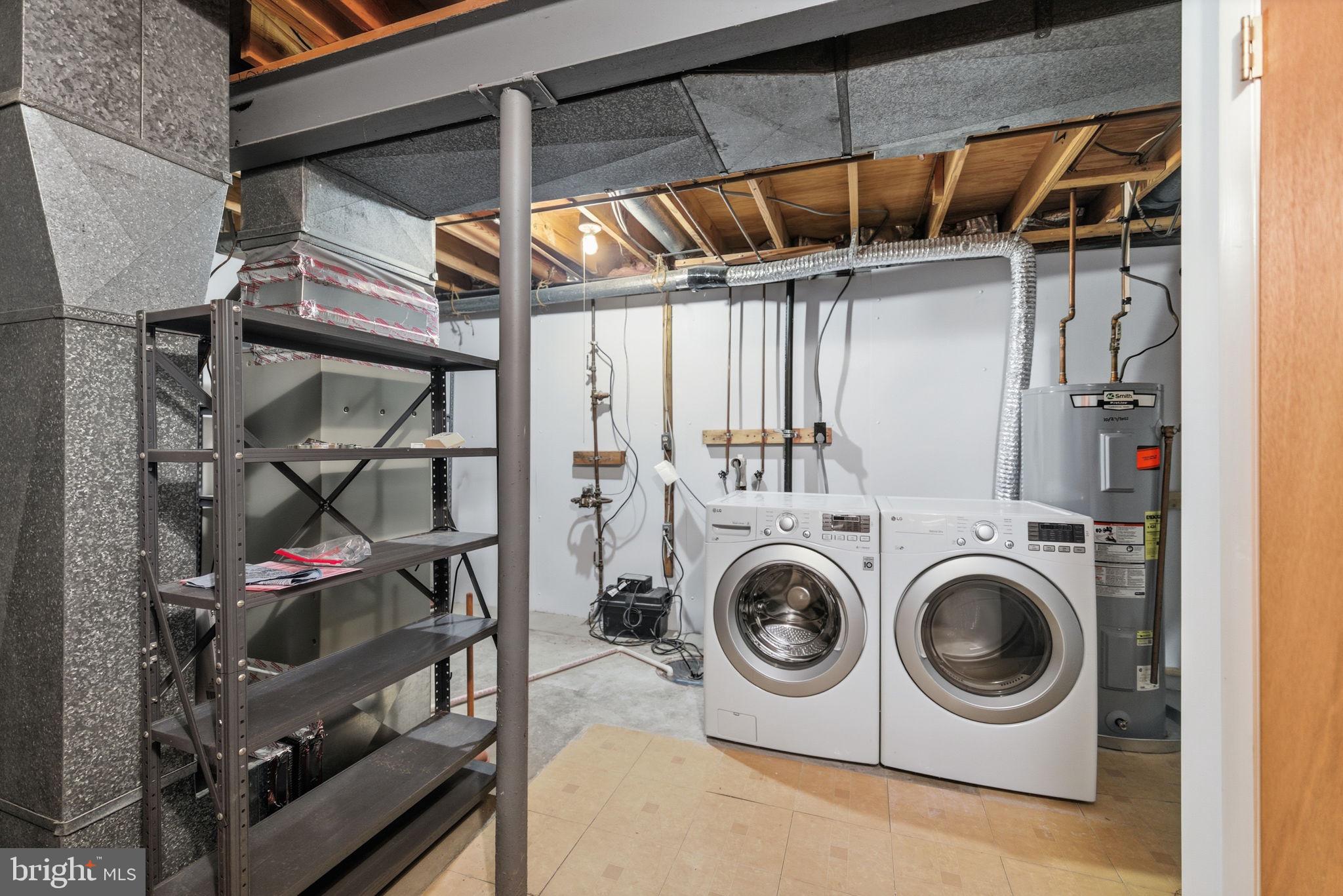 11563 Ivy Bush Court Reston, VA 20191 - Photo 18 of 48 a utility room with dryer and washer