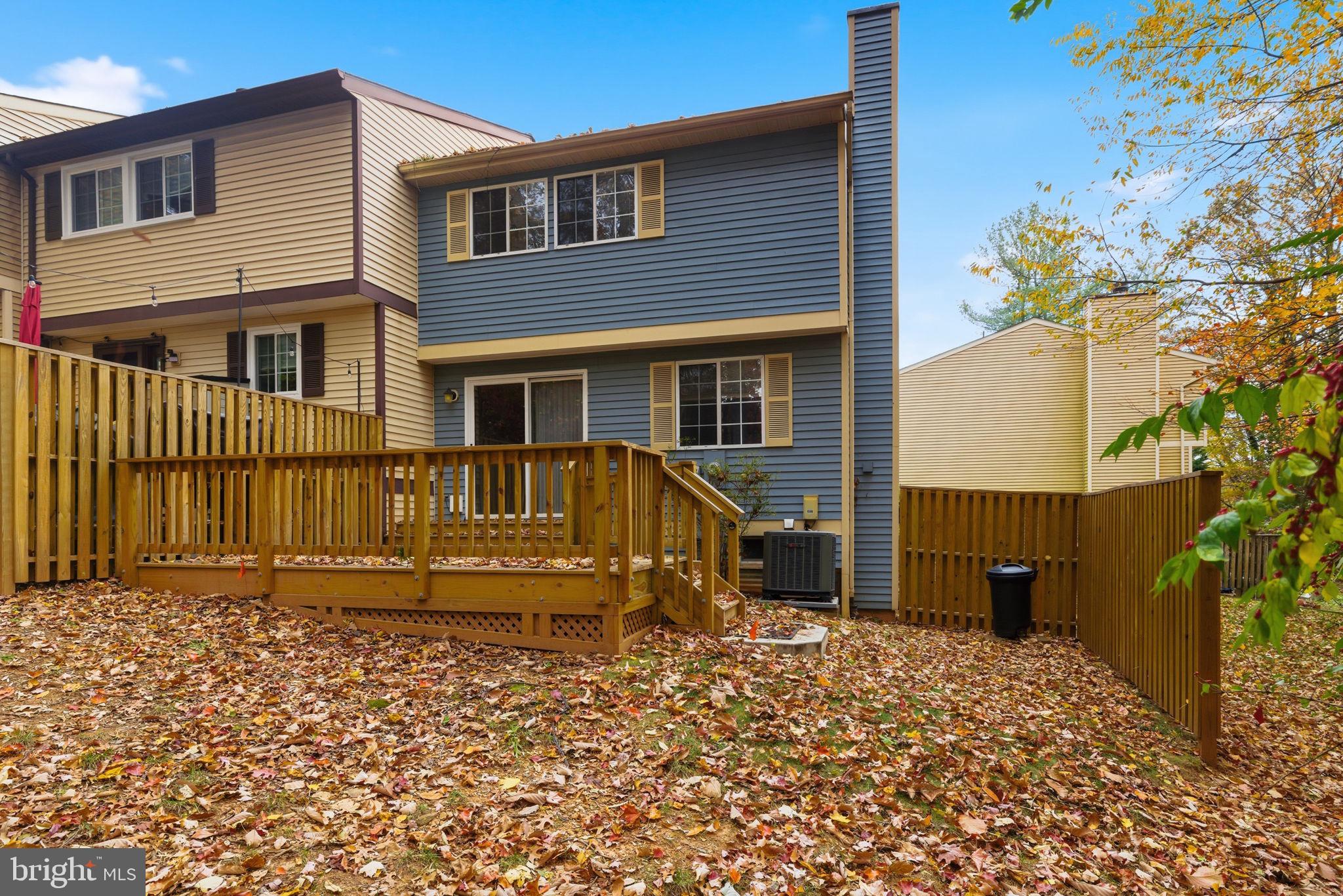 11563 Ivy Bush Court Reston, VA 20191 - Photo 19 of 48 a view of a house with a patio