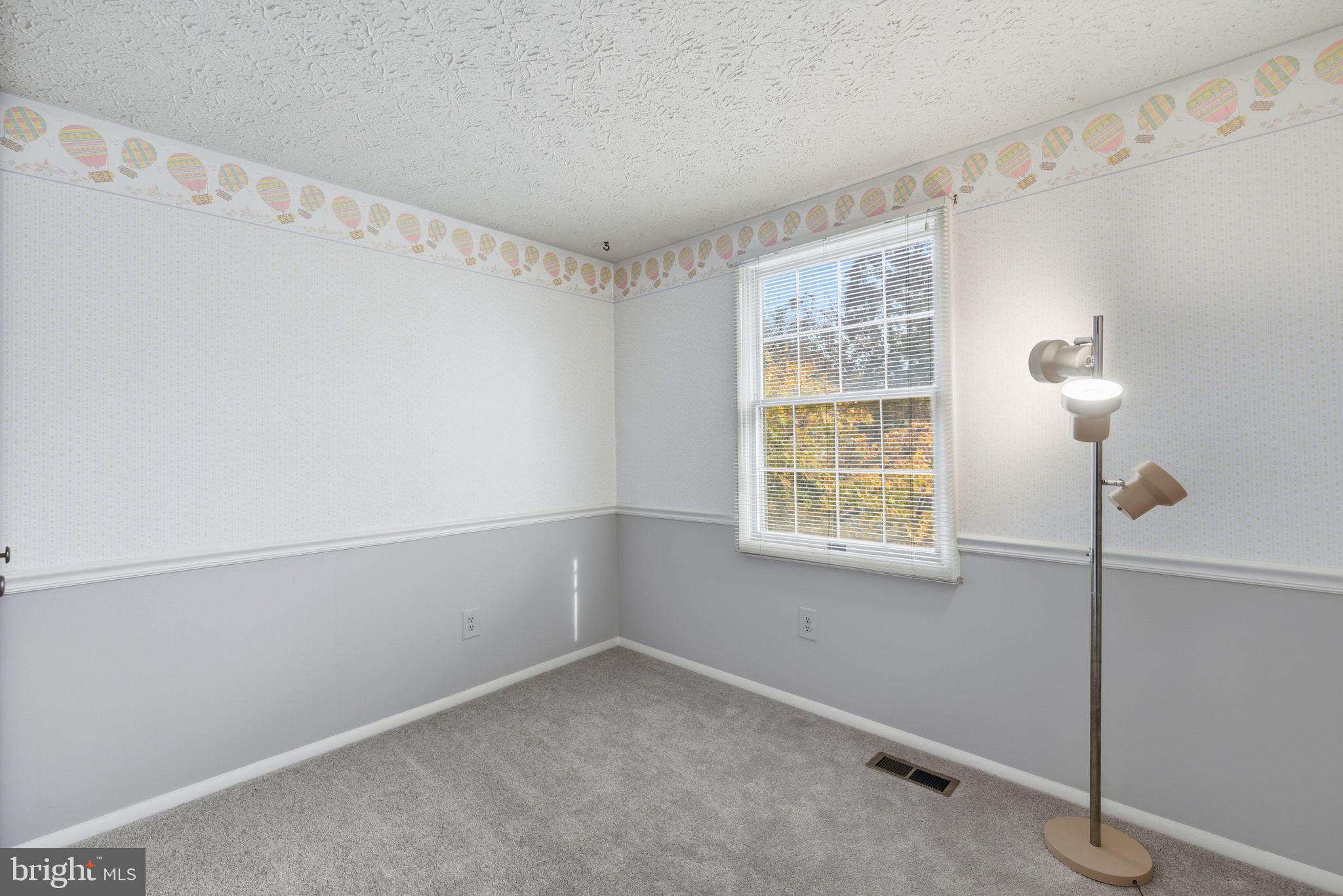 11563 Ivy Bush Court Reston, VA 20191 - Photo 9 of 48 a room that has a window in it