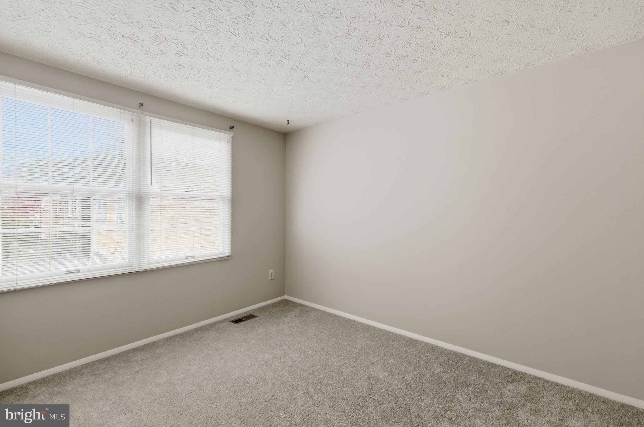 11563 Ivy Bush Court Reston, VA 20191 - Photo 10 of 48 an empty room with a window