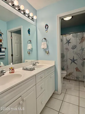 $365,000 | 305 North Topsail Drive, Unit 5, Surf City, NC 28445