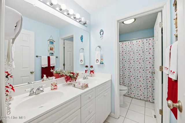 $365,000 | 305 North Topsail Drive, Unit 5, Surf City, NC 28445