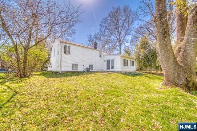 23 Smith Court Closter, NJ 07624 - Photo 23 of 23 a house view with swimming pool in front of house