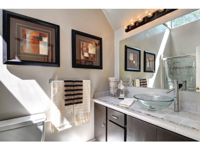 13 Farm Road Los Altos, CA 94024 - Photo 8 of 10 a bathroom with a double vanity sink and a mirror