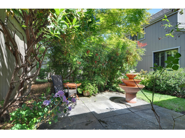 13 Farm Road Los Altos, CA 94024 - Photo 9 of 10 a backyard of a house with outdoor seating