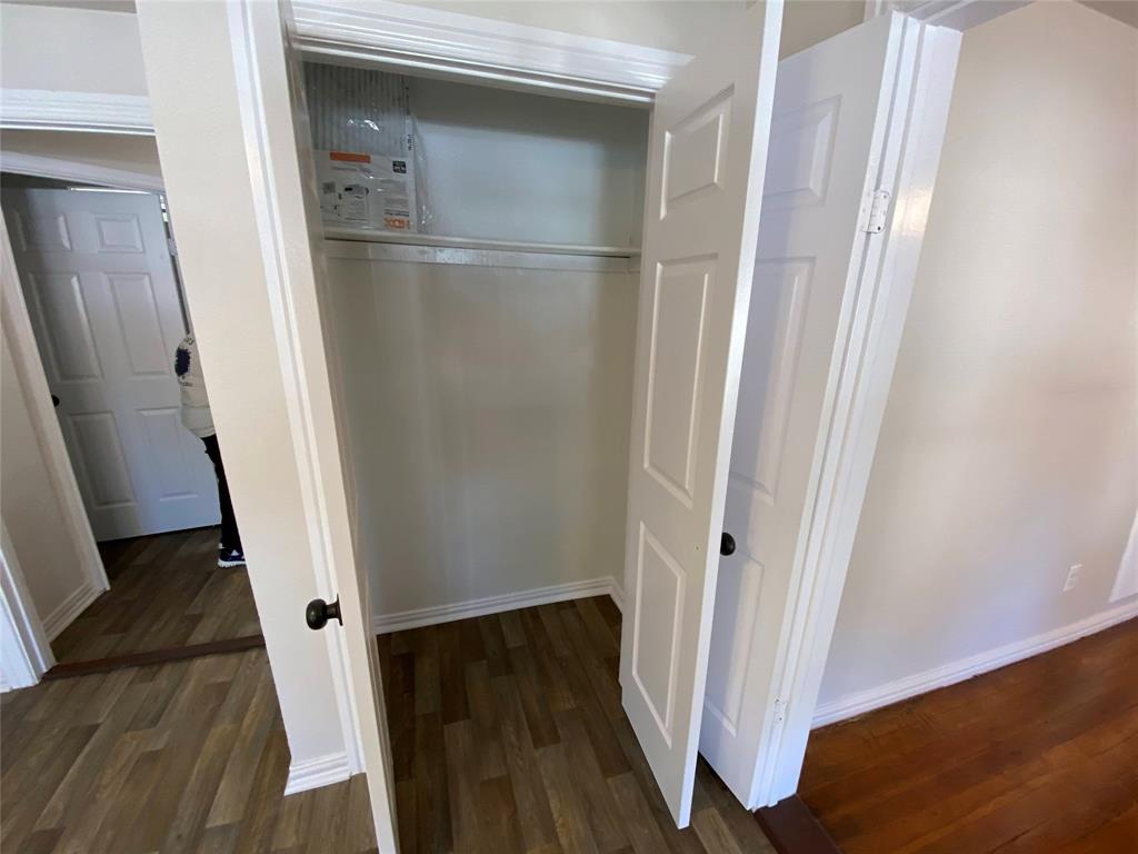 810 Greenville Road McKinney, TX 75069 - Photo 7 of 21 a view of a hallway with wooden floor