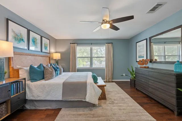 a bathroom with a sink a mirror and a shower