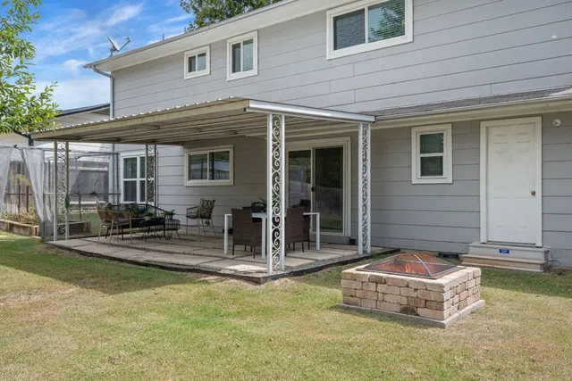 a house view with a garden space