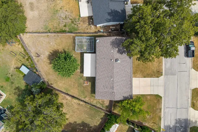 an aerial view of residential house with outdoor space
