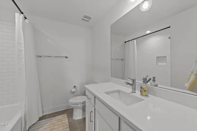 $495,000 | 2201 Millbank Village Court, Unit 101, Raleigh, NC 27610