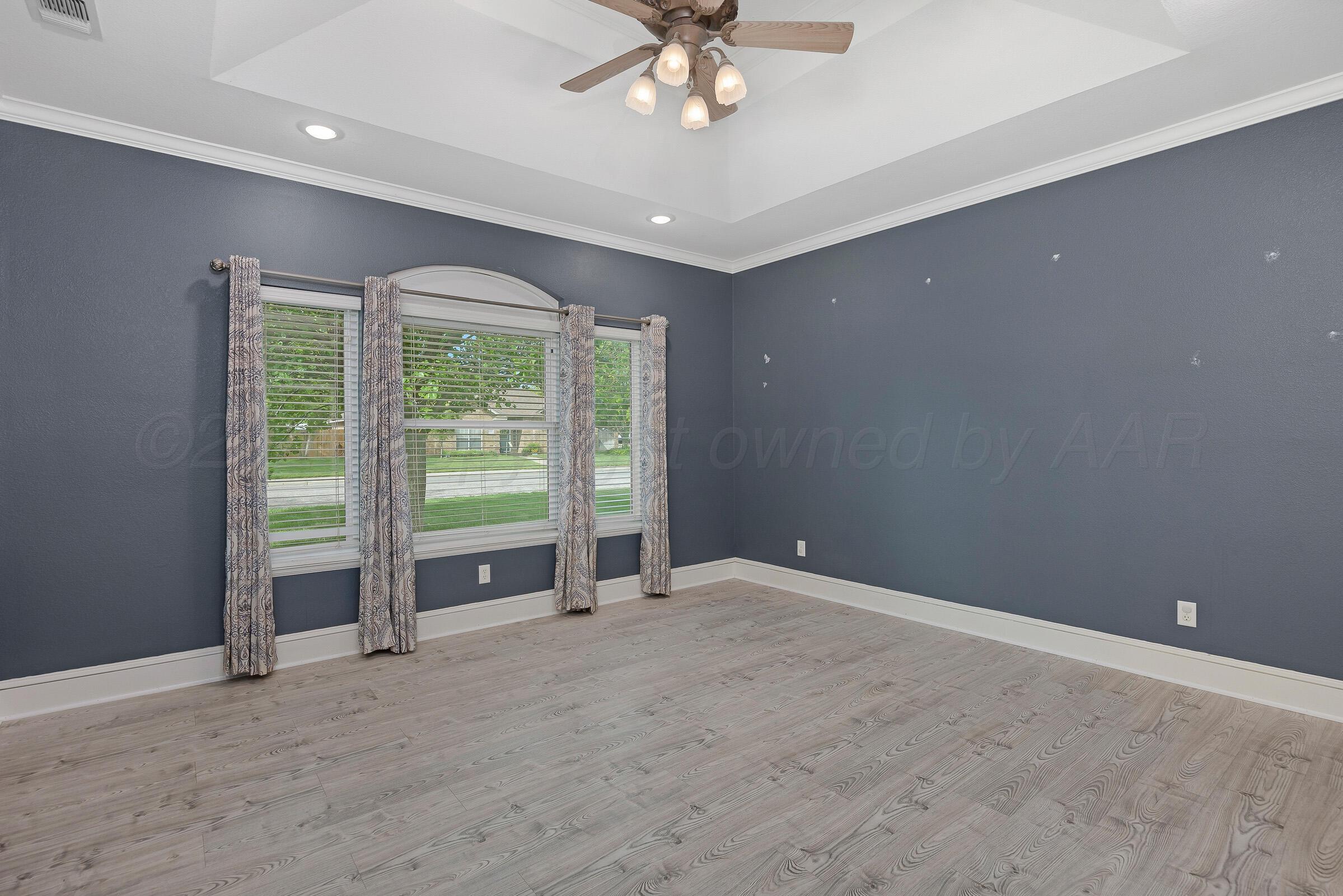 8211 Challenge Drive Amarillo, TX 79119 - Photo 14 of 31 a view of an empty room with a window
