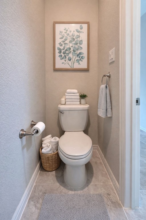 231 Moon Dance Court Conroe, TX 77304 - Photo 20 of 22 a bathroom with a toilet and a shower