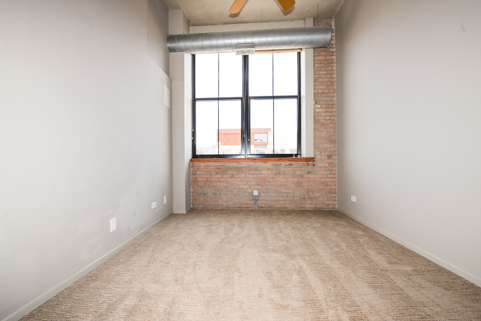 Undisclosed Address Chicago, IL 60607 - Photo 14 of 18 an empty room with a window
