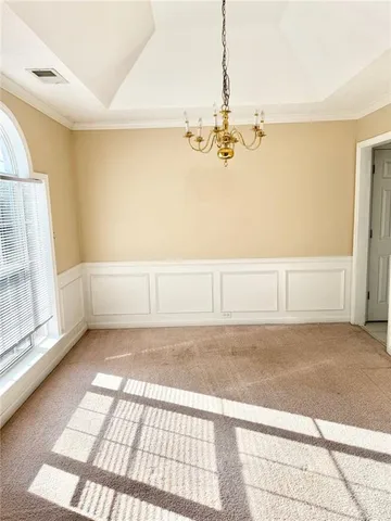 a bathroom with a glass door shower