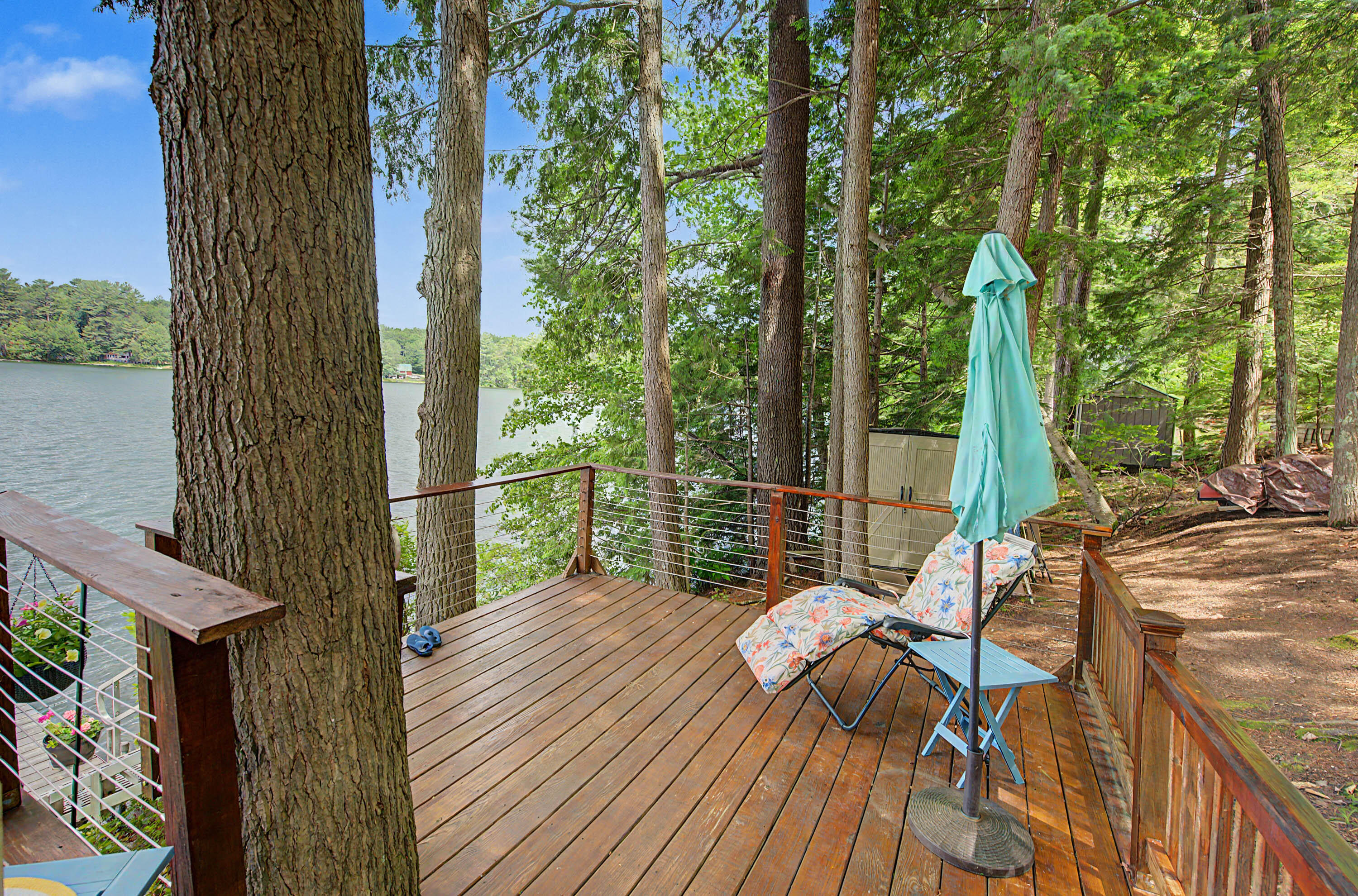 141 Coffee Pond Road Casco, ME 04015 - Photo 26 of 36 Lakefront deck lower level