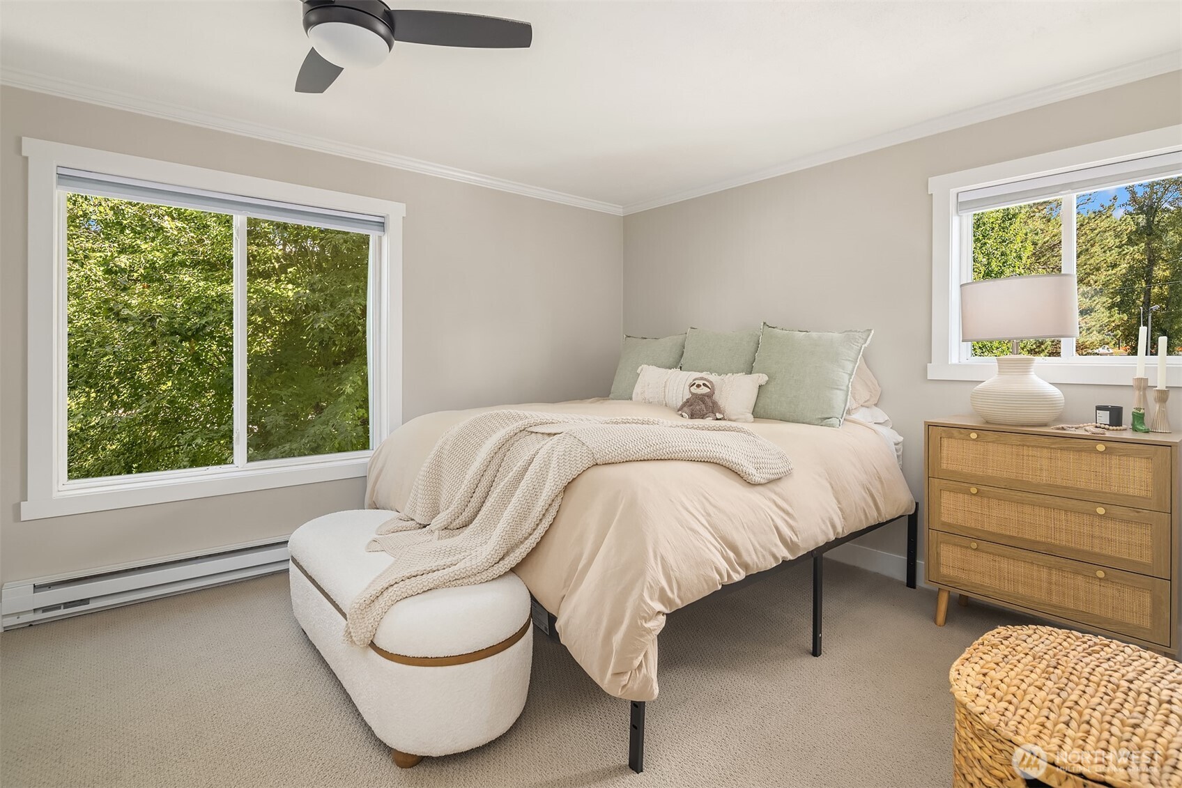 5021 Ripley Lane North, Unit 211 Renton, WA 98056 - Photo 14 of 25 a bedroom with a bed and a couch