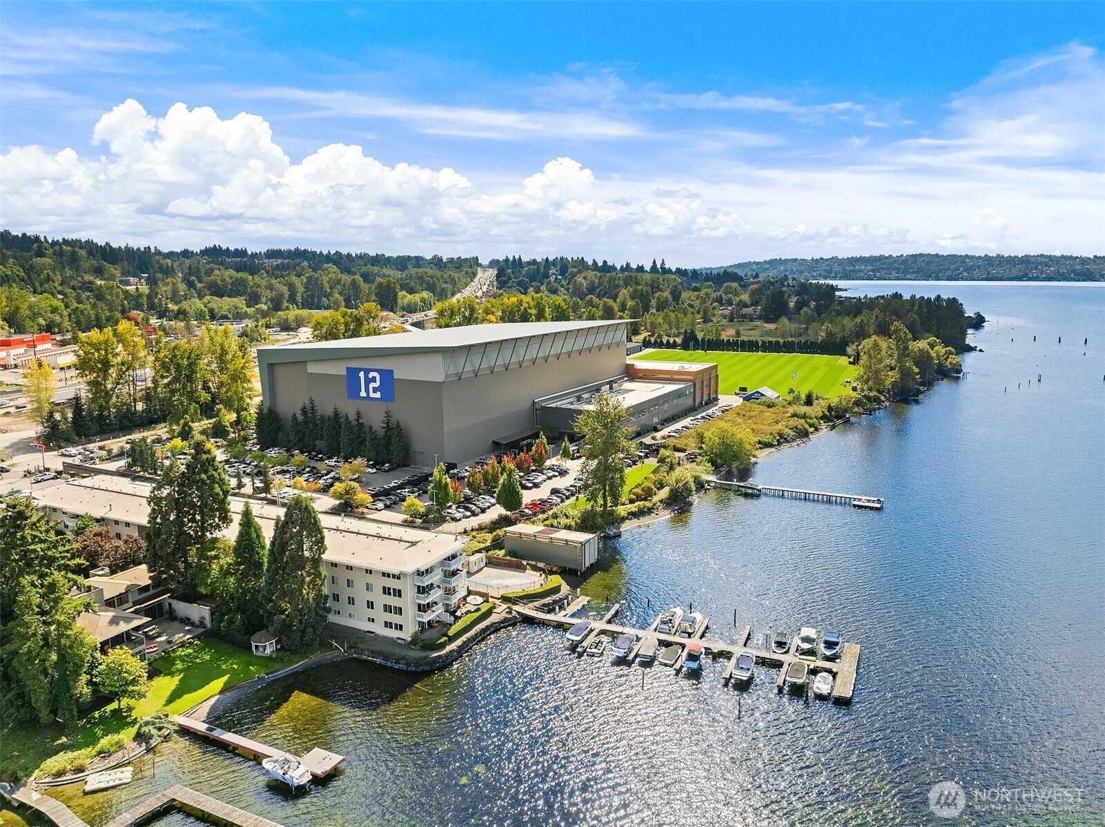 5021 Ripley Lane North, Unit 211 Renton, WA 98056 - Photo 2 of 25 an aerial view of a house with a lake view