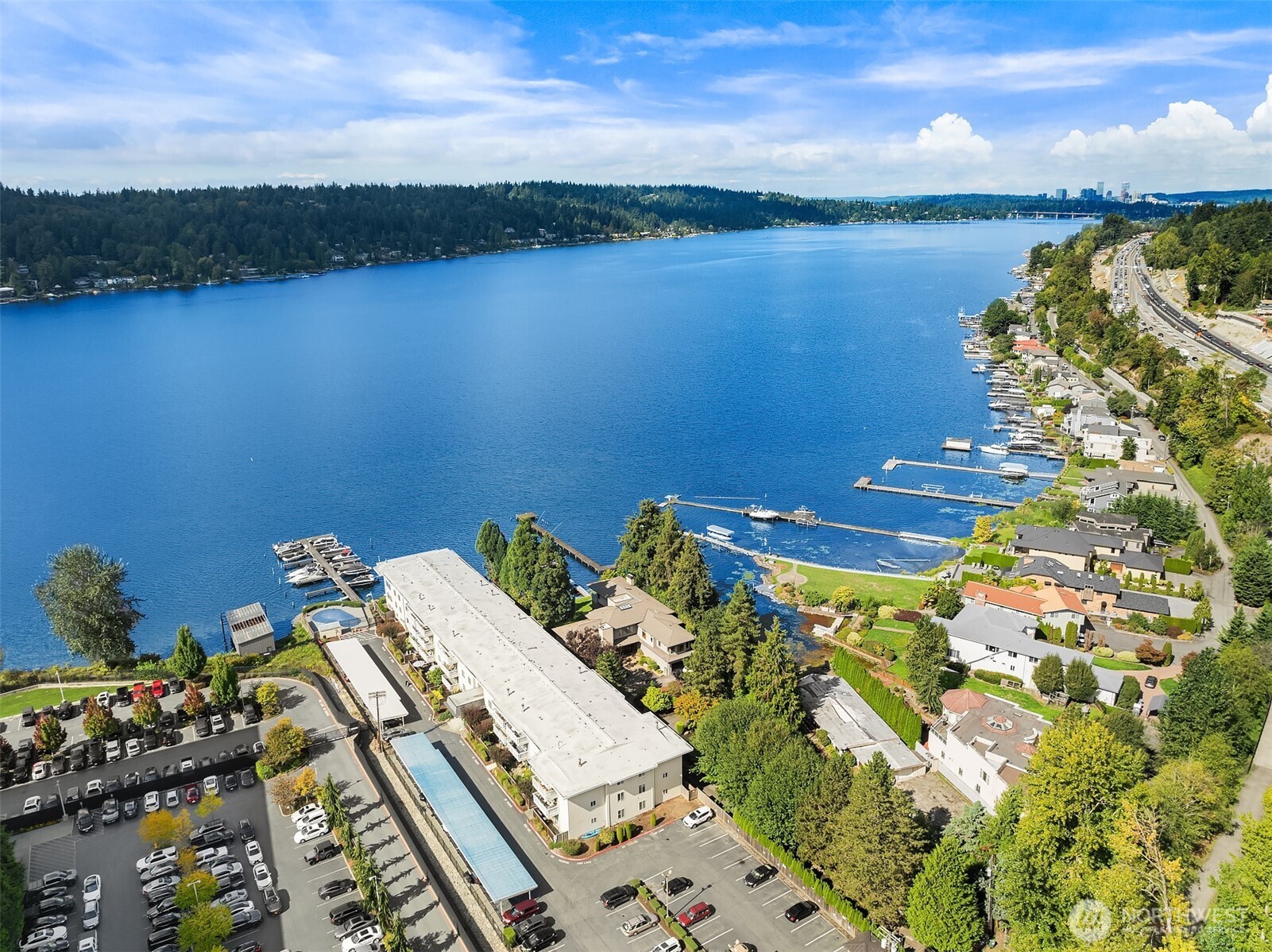 5021 Ripley Lane North, Unit 211 Renton, WA 98056 - Photo 21 of 25 a view of a lake with outside dining space