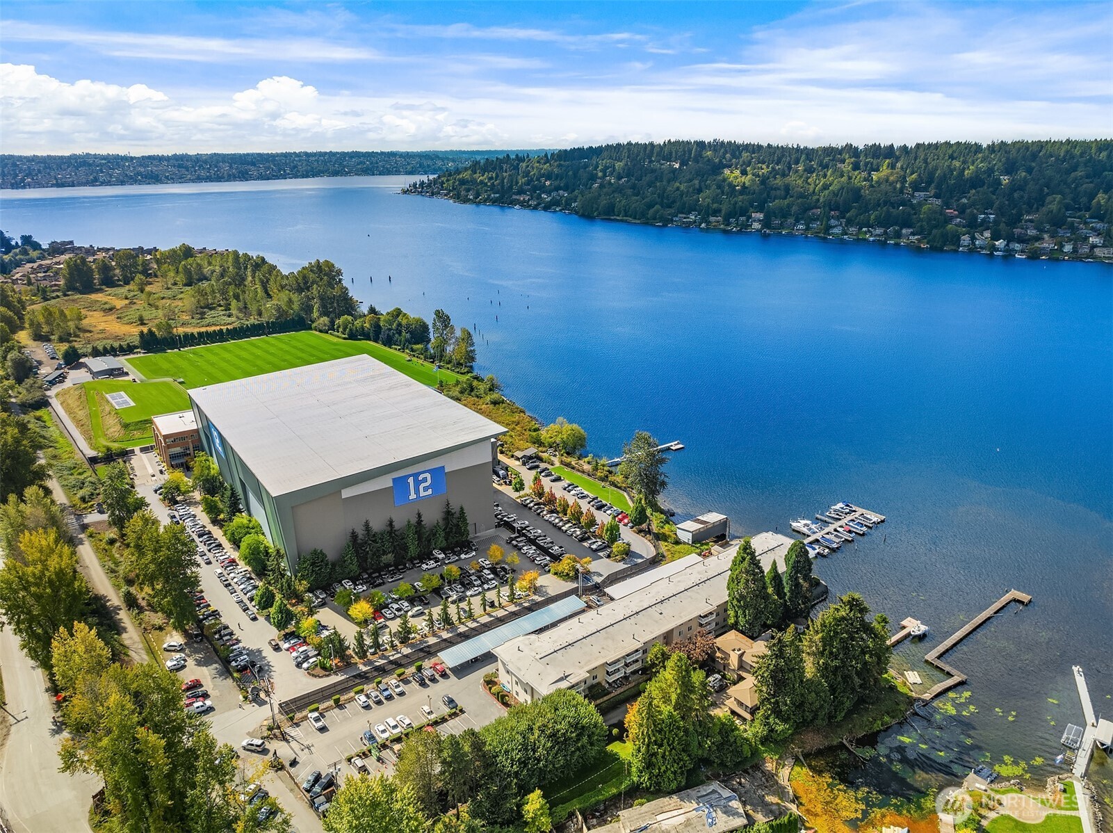 5021 Ripley Lane North, Unit 211 Renton, WA 98056 - Photo 24 of 25 an aerial view of a house with a lake view