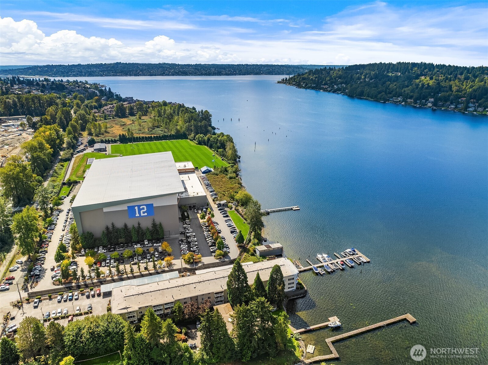 5021 Ripley Lane North, Unit 211 Renton, WA 98056 - Photo 25 of 25 an aerial view of a house with a lake view