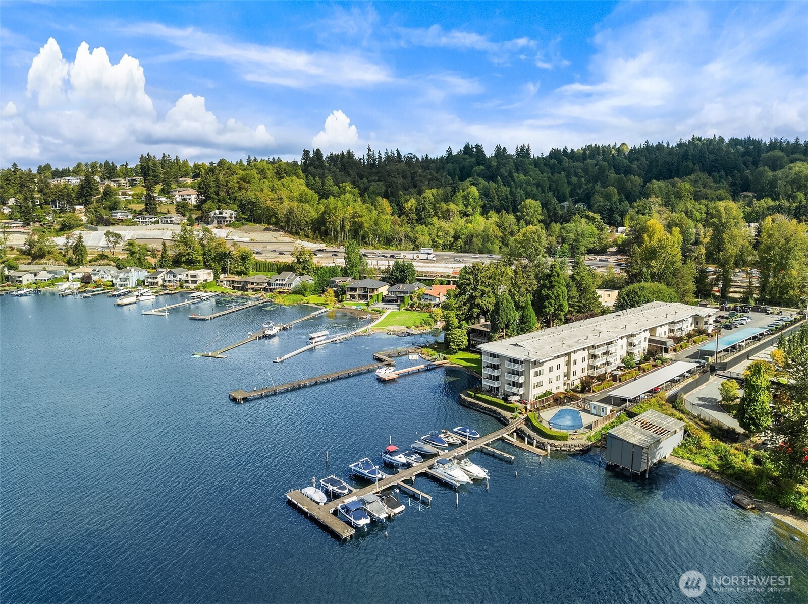 5021 Ripley Lane North, Unit 211 Renton, WA 98056 - Photo 3 of 25 a view of a city with an ocean