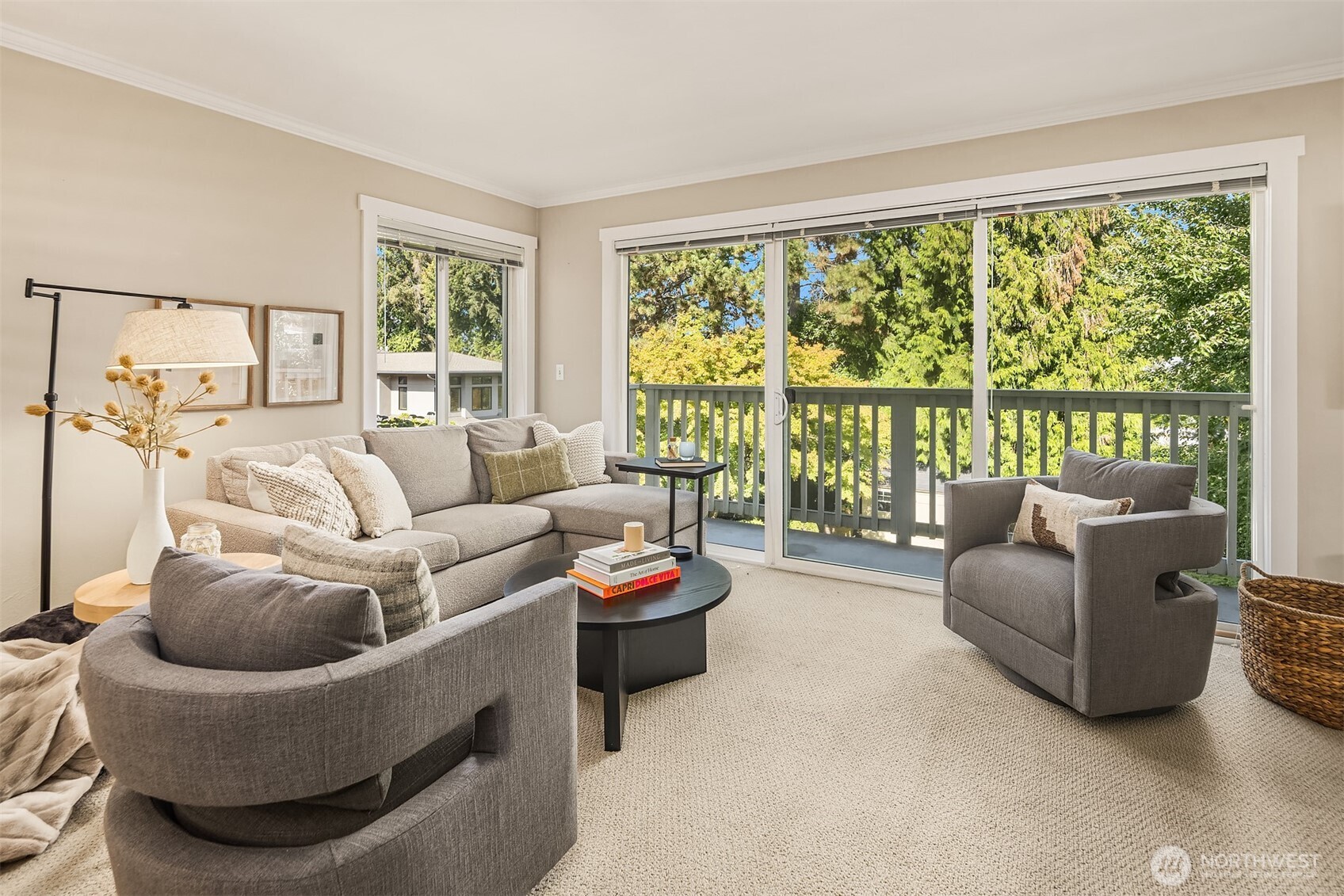 5021 Ripley Lane North, Unit 211 Renton, WA 98056 - Photo 6 of 25 a living room with furniture and a large window