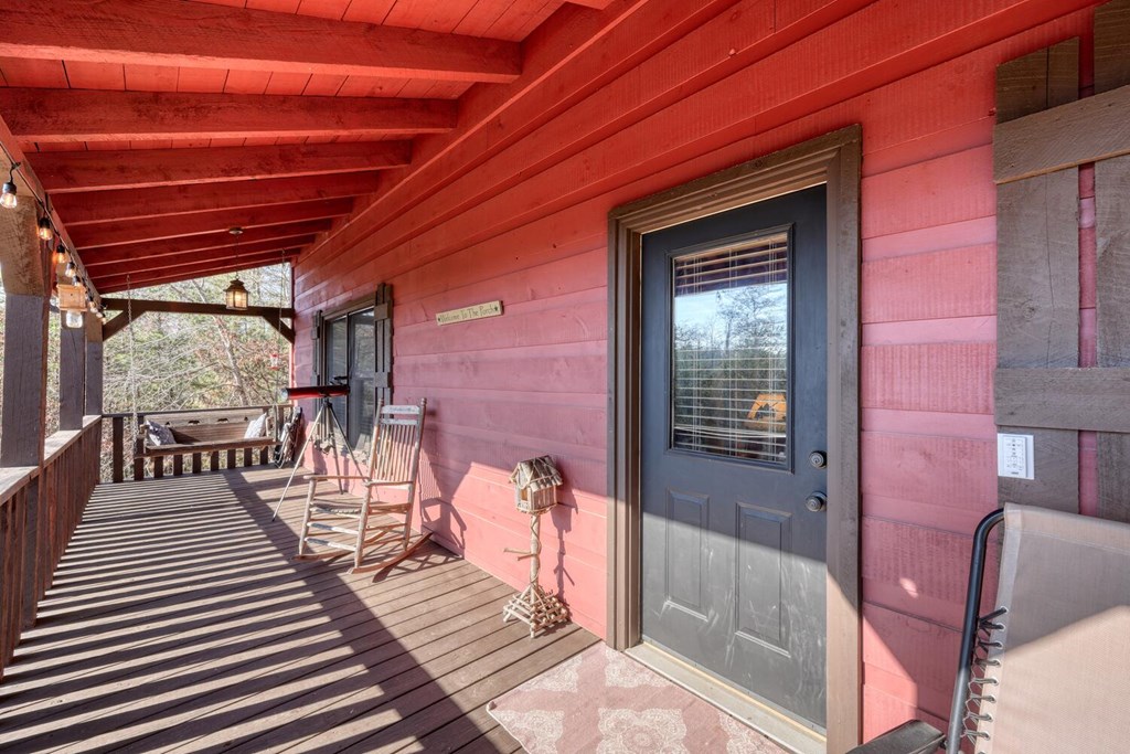 2567 Todd Shook Road Young Harris, GA 30582 - Photo 14 of 62 a view of a balcony with chairs