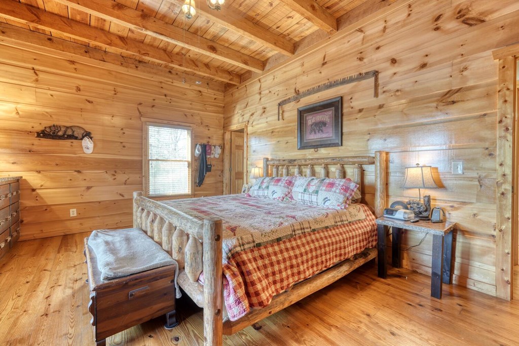 2567 Todd Shook Road Young Harris, GA 30582 - Photo 22 of 62 a bedroom with a bed and a night stand