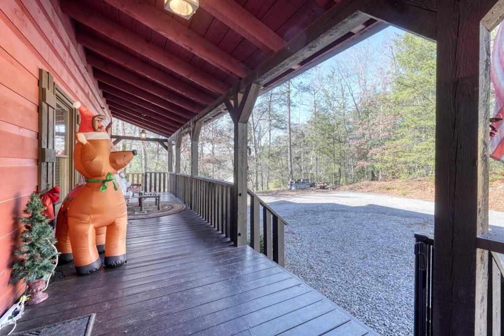 2567 Todd Shook Road Young Harris, GA 30582 - Photo 56 of 62 a view of living room with wooden floor and windows
